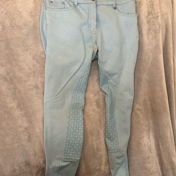 Horze breeches
Light turquoise 
Some staining but great condition   
Size 26 - Picture 3 of 4